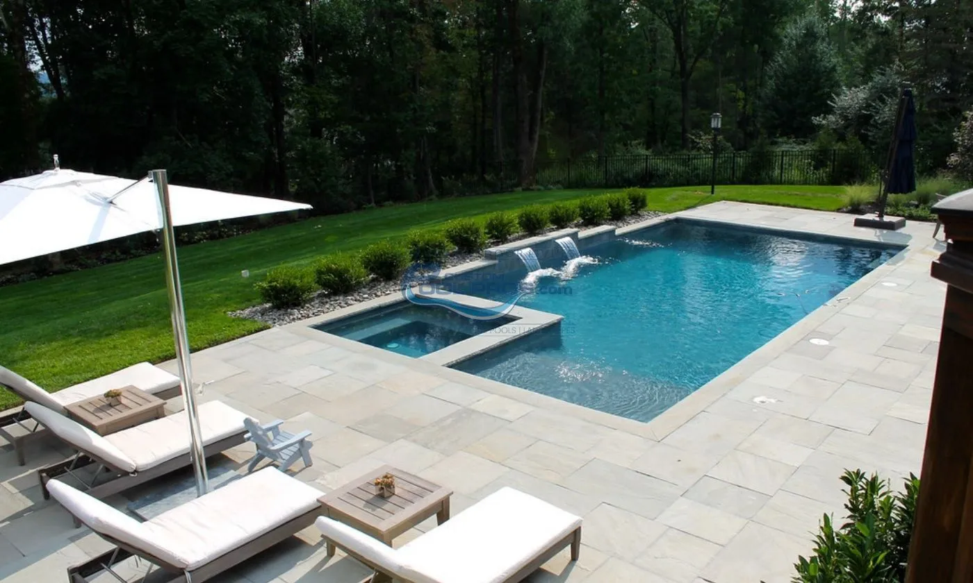 inground pool with spa and waterfalls installation, inground swimming pool