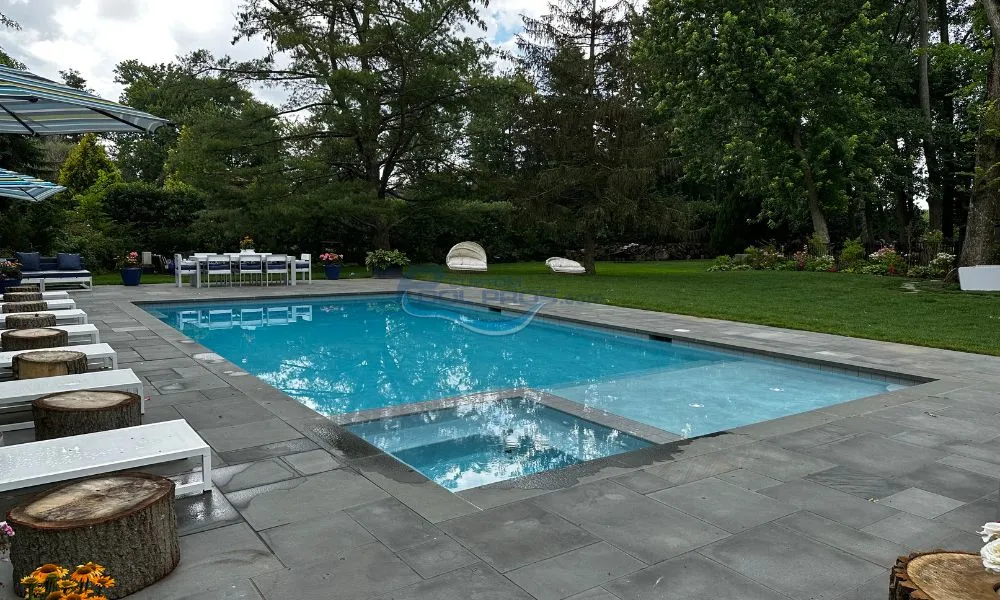 modern pool deck and fiberglass pool with spa in Scotch Plains NJ
